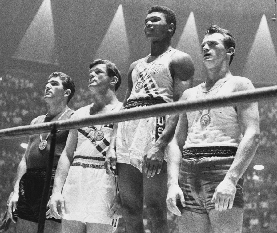 Cassius Clay (now Muhammad Ali) claims gold at the 1960 Olympic Games