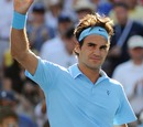 Roger Federer waves to the crowd