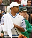 Tiger Woods and Tom Watson wait to tee off