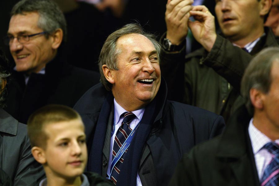 Gerrard Houllier laughs whilst in the crowd
