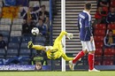 Allan McGregor sees the ball fly past him