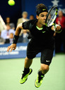 Rafael Nadal flies through the air for a volley