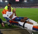 Theo Walcott is stretchered off