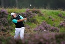 Francesco Molinari plays his approach shot on the 11th hole