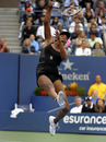 Venus Williams climbs for a smash