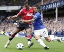 Nani battles for the ball with Tim Cahill