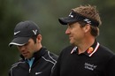 Ian Poulter and Paul Casey wait to play