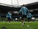 Tottenham's players warm up during a training session