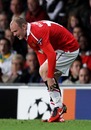 Wayne Rooney winces with pain