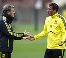 Liverpool manager Roy Hodgson chats with Jamie Carragher 
