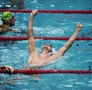 Adrian Moorhouse celebrates first place and winning gold in the Men's 100m Breaststroke final