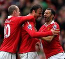 Wayne Rooney, Dimitar Berbatov and Ryan Giggs rejoice
