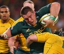 South Africa's John Smit is shackled by the Australia defence