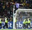 Ahmed Al Muhammadi celebrates on top of his goal