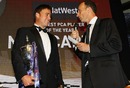 Nasser Hussain awards Neil Carter the PCA Player of the Year Award