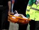 Moussa Dembele gets stretchered from the field