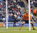 Jussi Jaaskelainen watches the ball sail past him