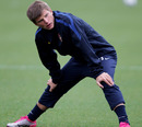 Andriy Arshavin stretches during an Arsenal training session