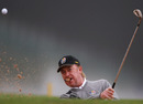 Miguel Angel Jimenez plays out of the sand