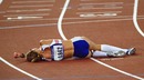 Paula Radcliffe lies exhausted