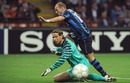Wesley Sneijder clips the ball past Tim Wiese