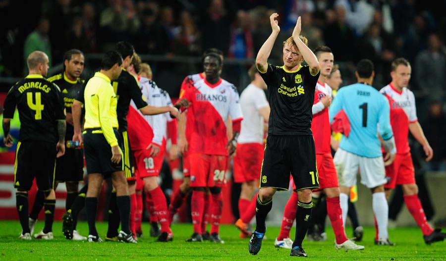 Dirk Kuyt applauds Liverpool's travelling fans