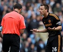 John Terry argues with the referee