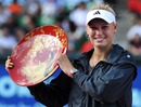 Caroline Wozniacki holds the trophy