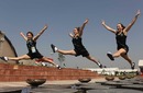 New Zealand gymnasts Holly Moon, Jordan Rae and Briana Mitchell pose for a photo 