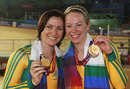 Anna Meares and Kaarle McCulloch show off their gold medals from the women's team sprint