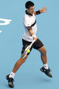 Novak Djokovic drills a forehand