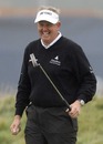 Colin Montgomerie raises a smile on the first green