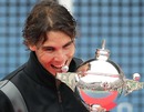 Rafael Nadal shows off his trophy