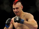 Dan Hardy smiles at Georges St-Pierre