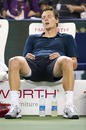 An exhausted Tomas Berdych takes a breather