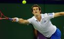 Andy Murray stretches to reach the ball