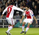 Mounir El Hamdaoui and Luis Suarez celebrate Ajax's second