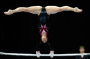 Beth Tweddle performs on the uneven bars
