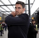 Kevin Pietersen carries his luggage as the England team depart for The Ashes