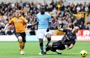 Mario Balotelli is denied by the Wolves defence