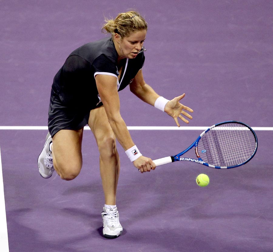 Kim Clijsters meets the ball against Samantha Stosur
