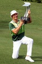 Ben Crane poses with his trophy