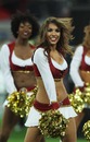 A 49ers cheerleader before the game starts