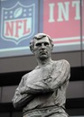 Bobby Moore's statue in front of NFL branding