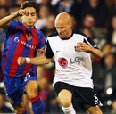 Andy Johnson takes on Serkan Sahin of FC Basel