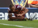 Leroy Cudjoe dives over to score a try