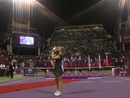 Kim Clijsters kisses the trophy after beating Caroline Wozniacki