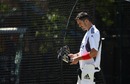 Kevin Pietersen puts on his helmet at England's net session