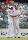 Graeme Swann and Andrew Strauss celebrate a wicket