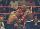 Evander Holyfield punches Mike Tyson